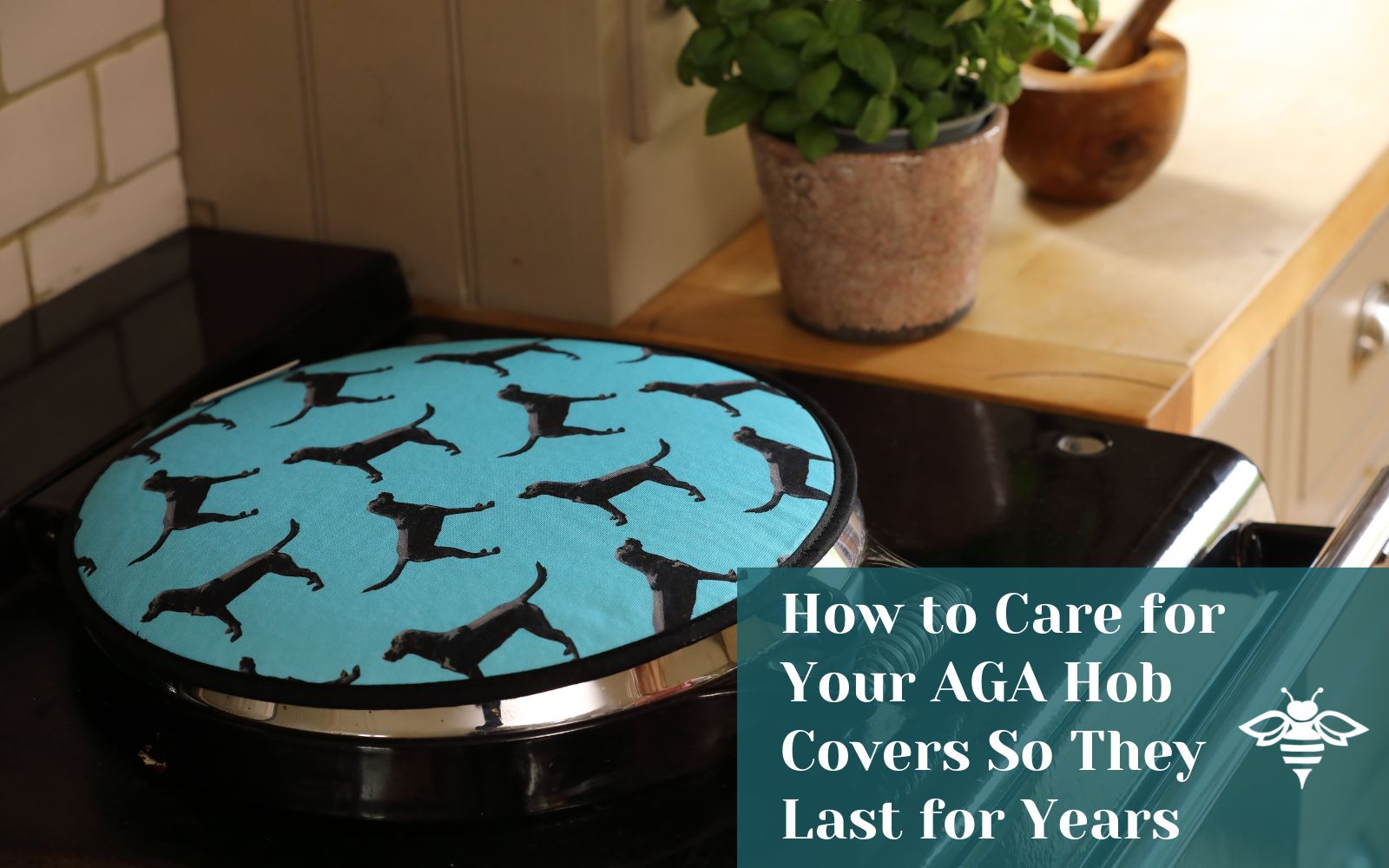 AGA cooker with colourful fabric hob cover in a warm farmhouse kitchen