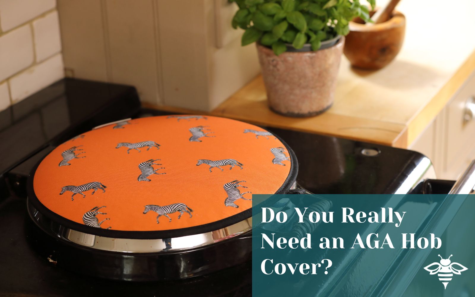 British-made AGA hob cover on Aga cooker in country kitchen