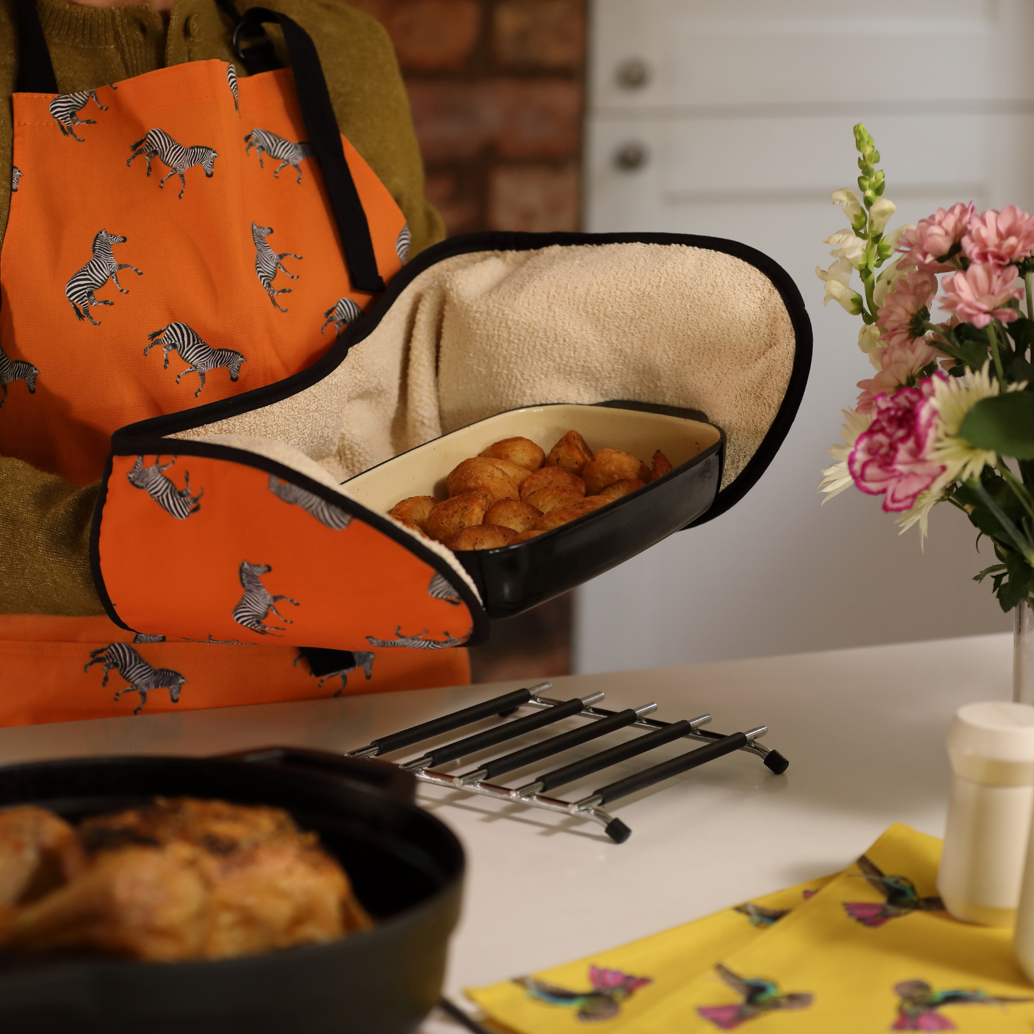 The Artisan Starter Set – hand-illustrated British-made apron, oven glove, and tea towel by Tracey Cooper.