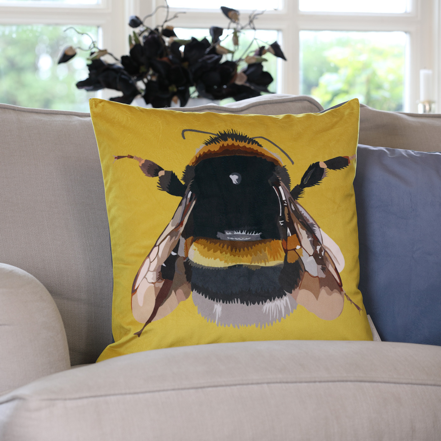 Bee velvet cushion with hand-illustrated bumble bee design by Tracey Cooper Homeware