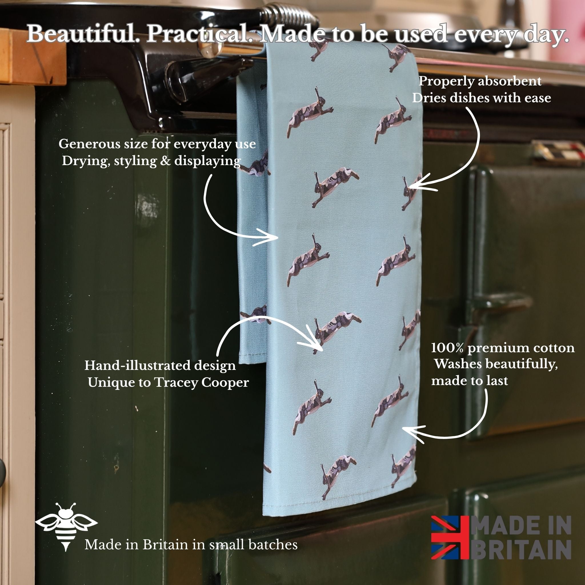 Towel with hare pattern on a kitchen towel rack, featuring text about its qualities.