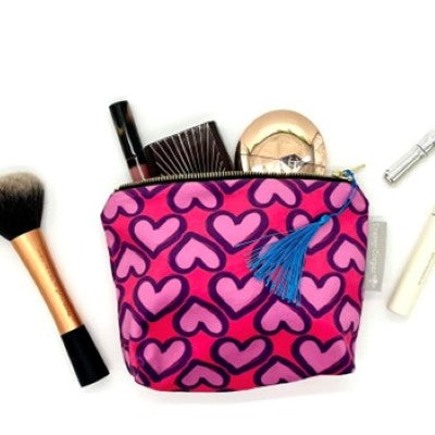 Pink hearts velvet makeup bag with hand-illustrated heart design by Tracey Cooper