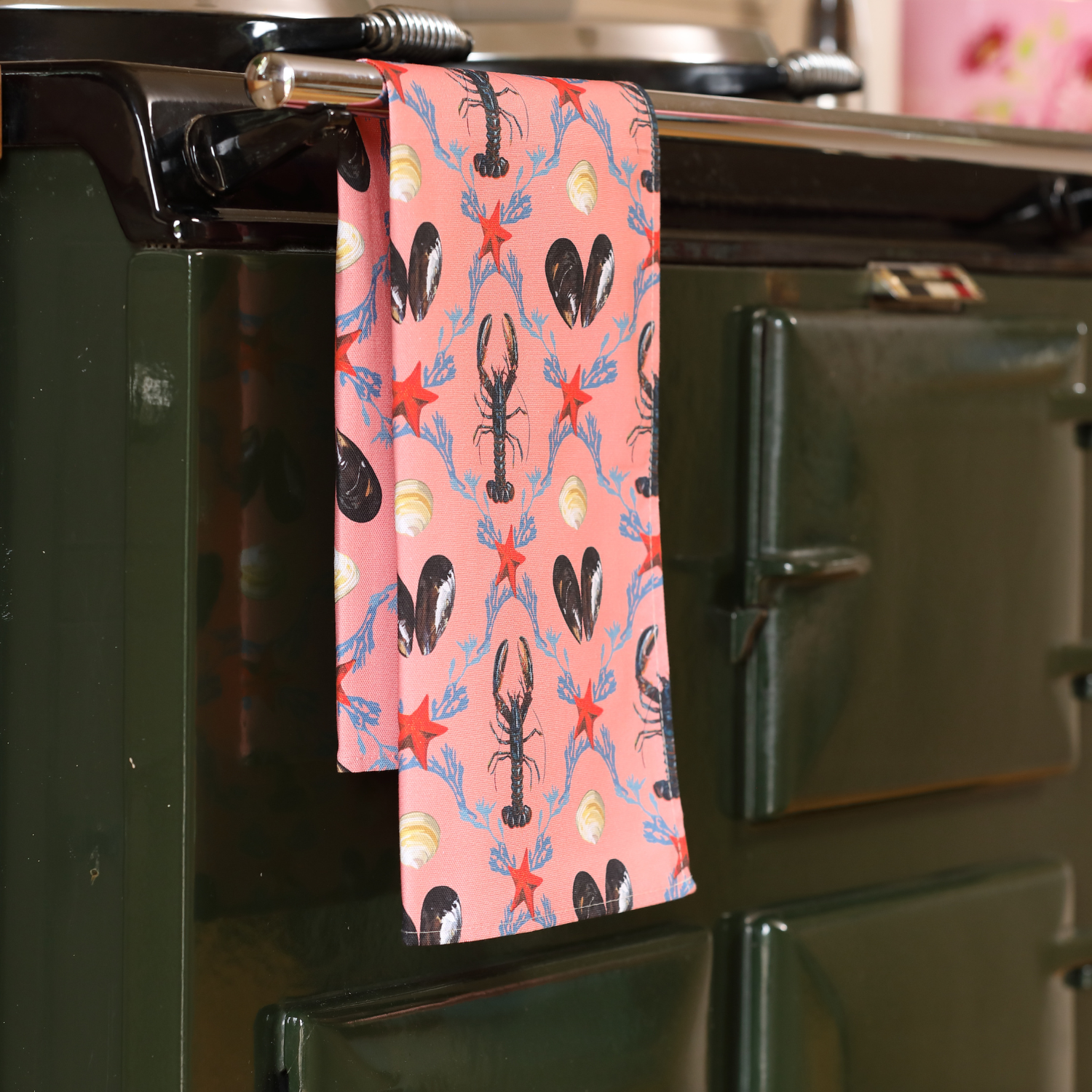 Lobster tea towel on an aga