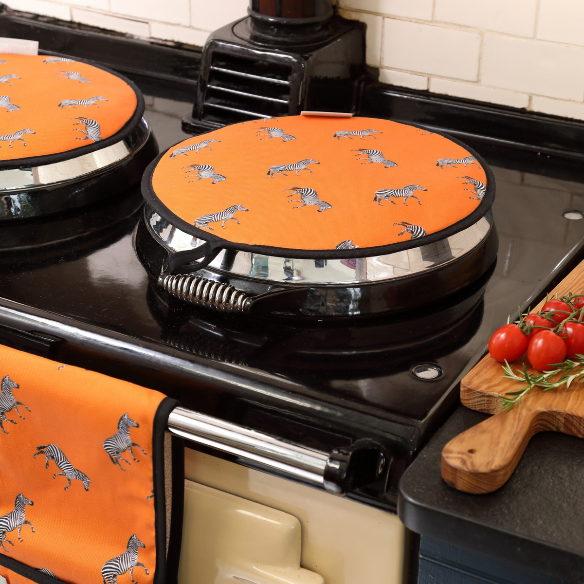 Orange Aga Hob Cover on an Aga in country kitchen