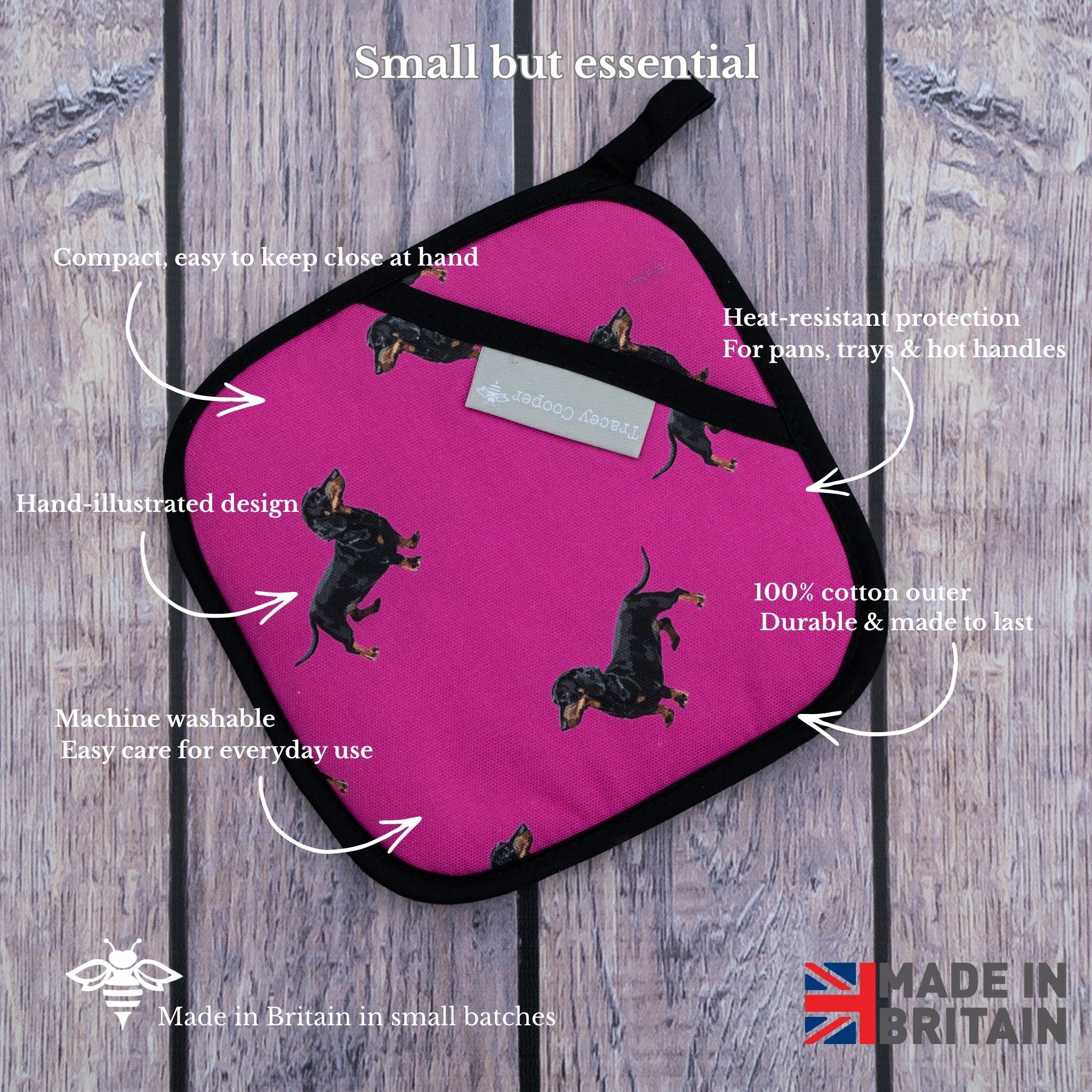 Pink pot holder with dachshund design on a wooden background, featuring text about product features.