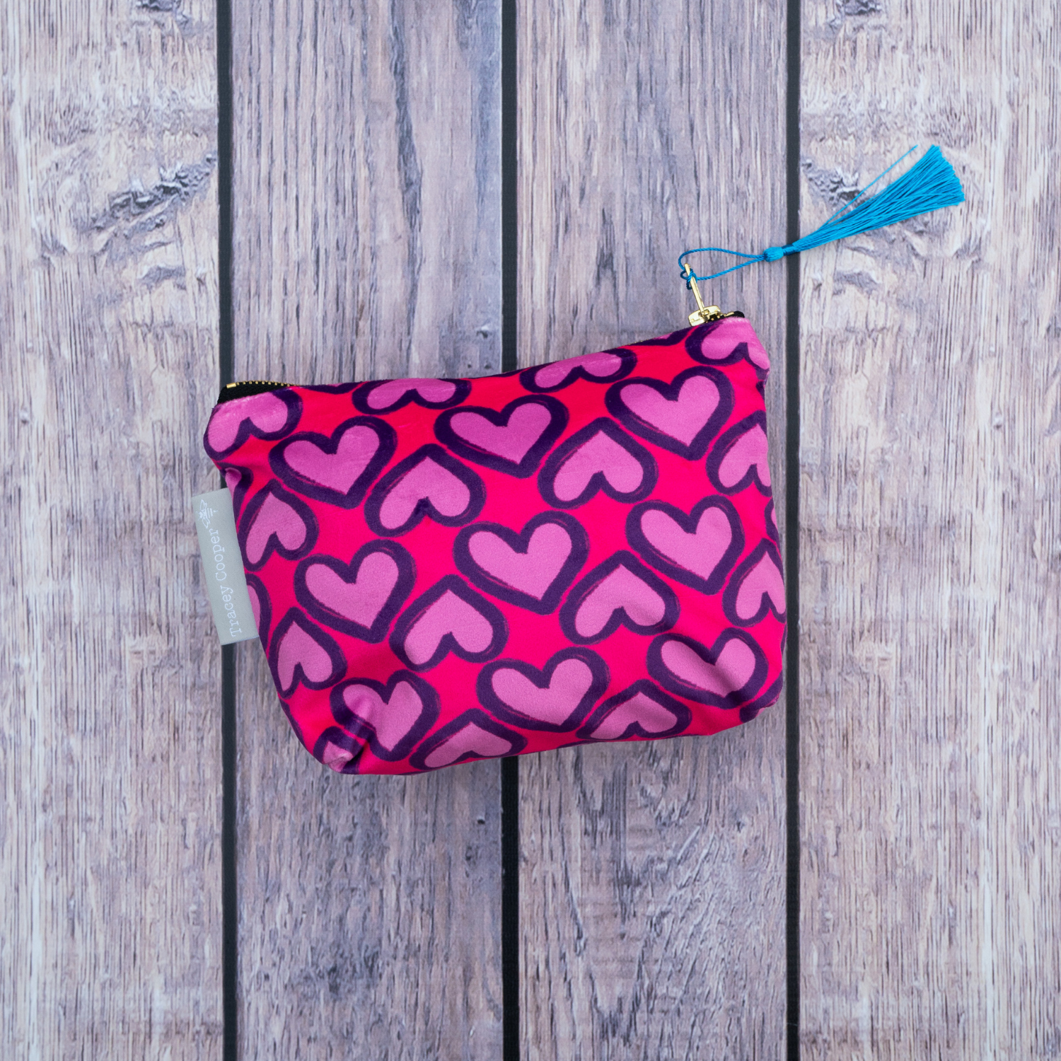 Pink hearts velvet makeup bag with hand-illustrated heart design by Tracey Cooper