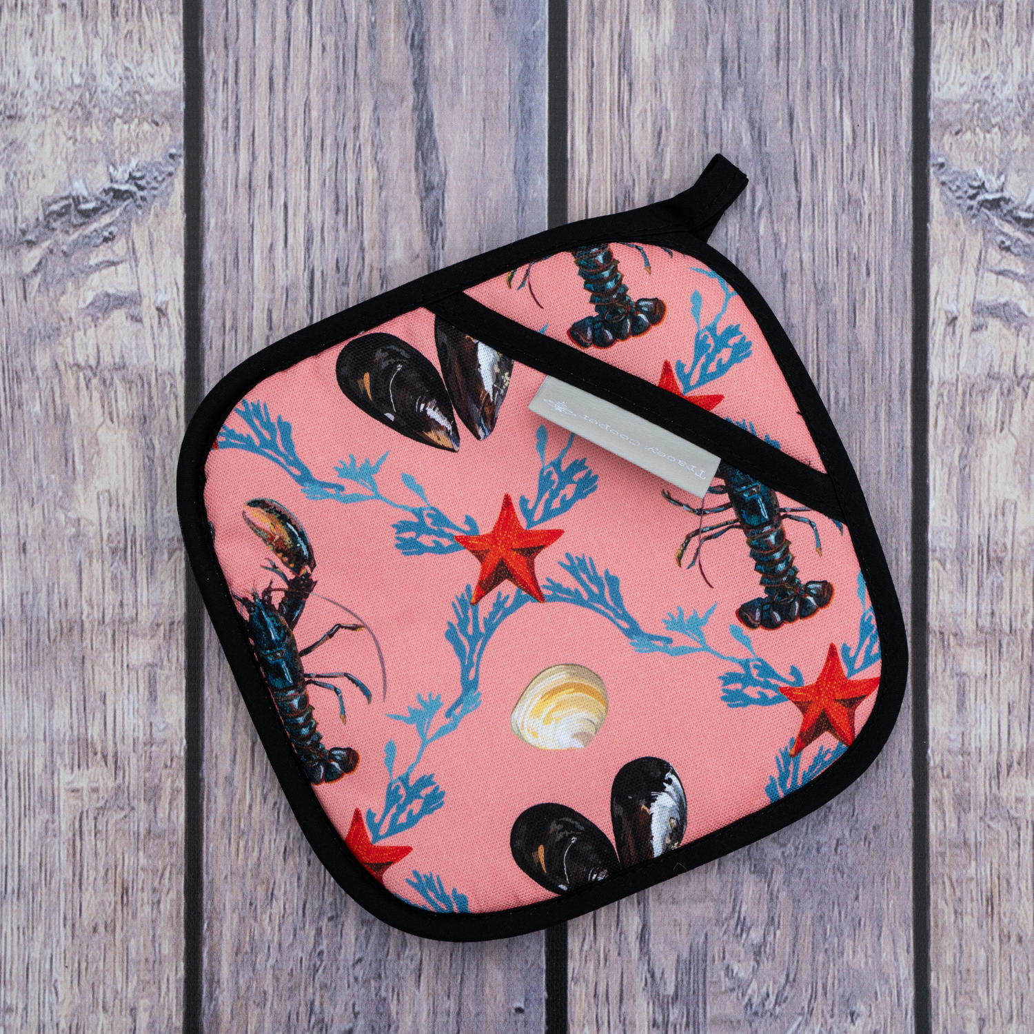 Hand illustrated lobster pot grab salmon pink background