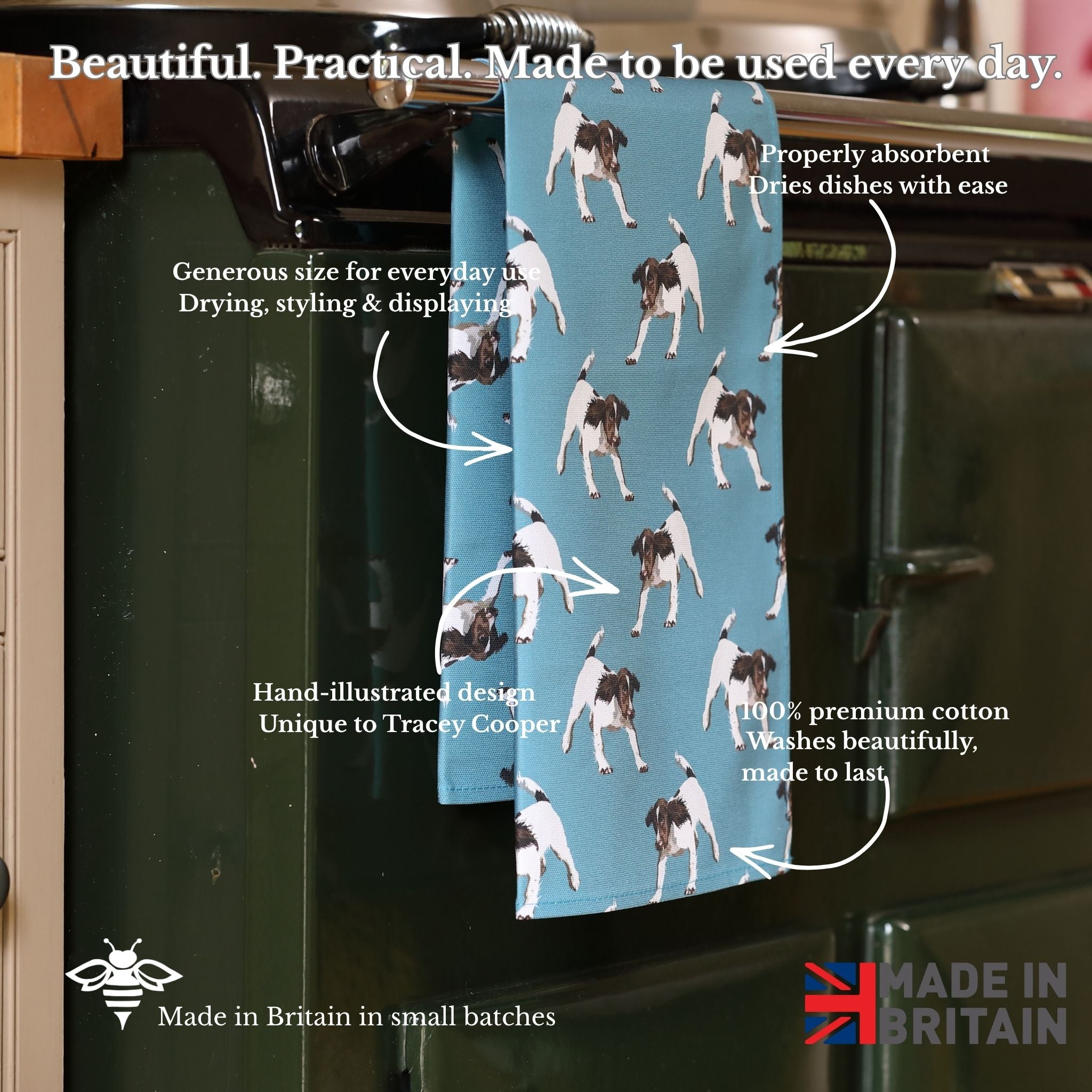 Blue towel with dog pattern hanging on a kitchen rack, with text describing its features.
