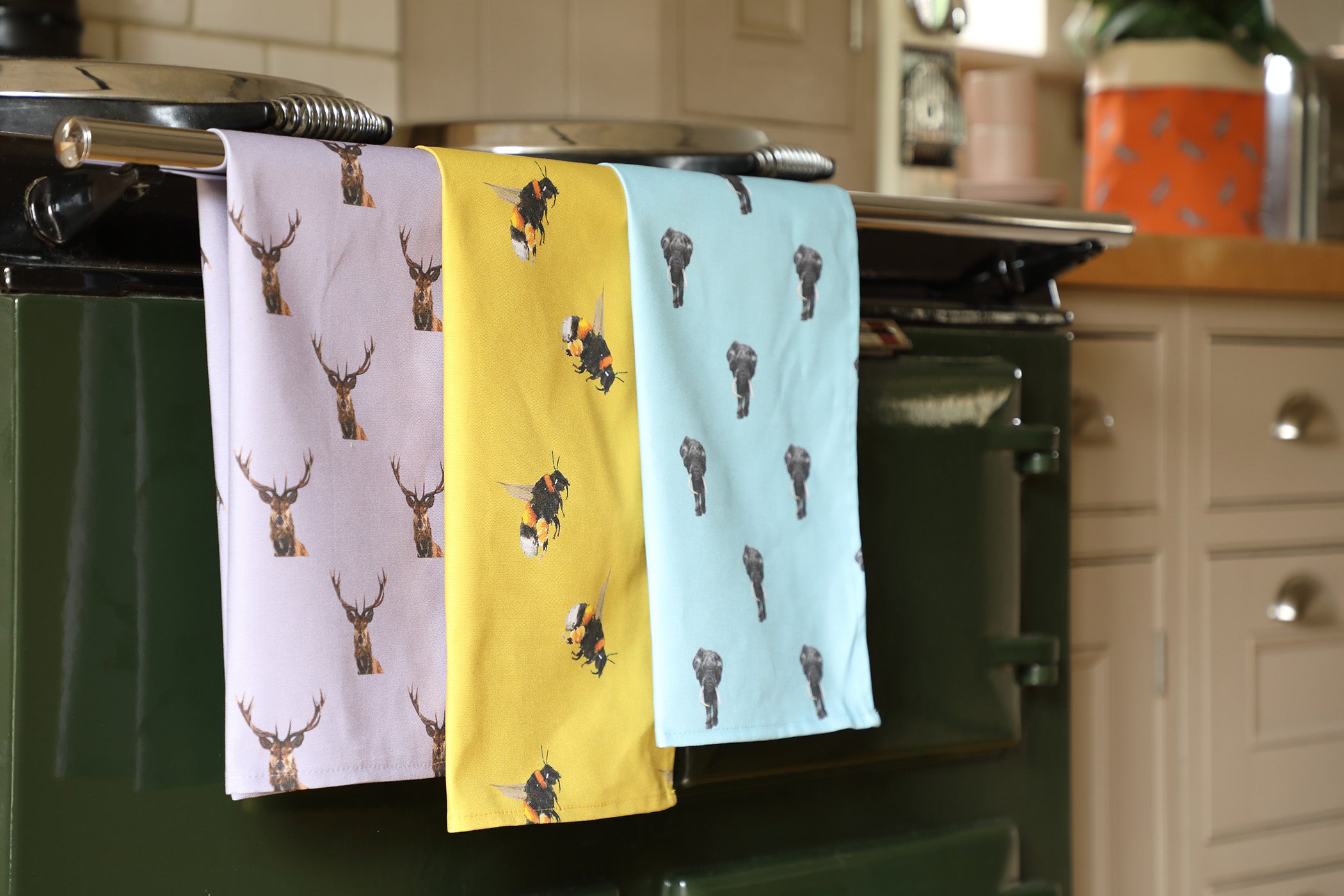 Colourful British Made Tea Towels on an aga