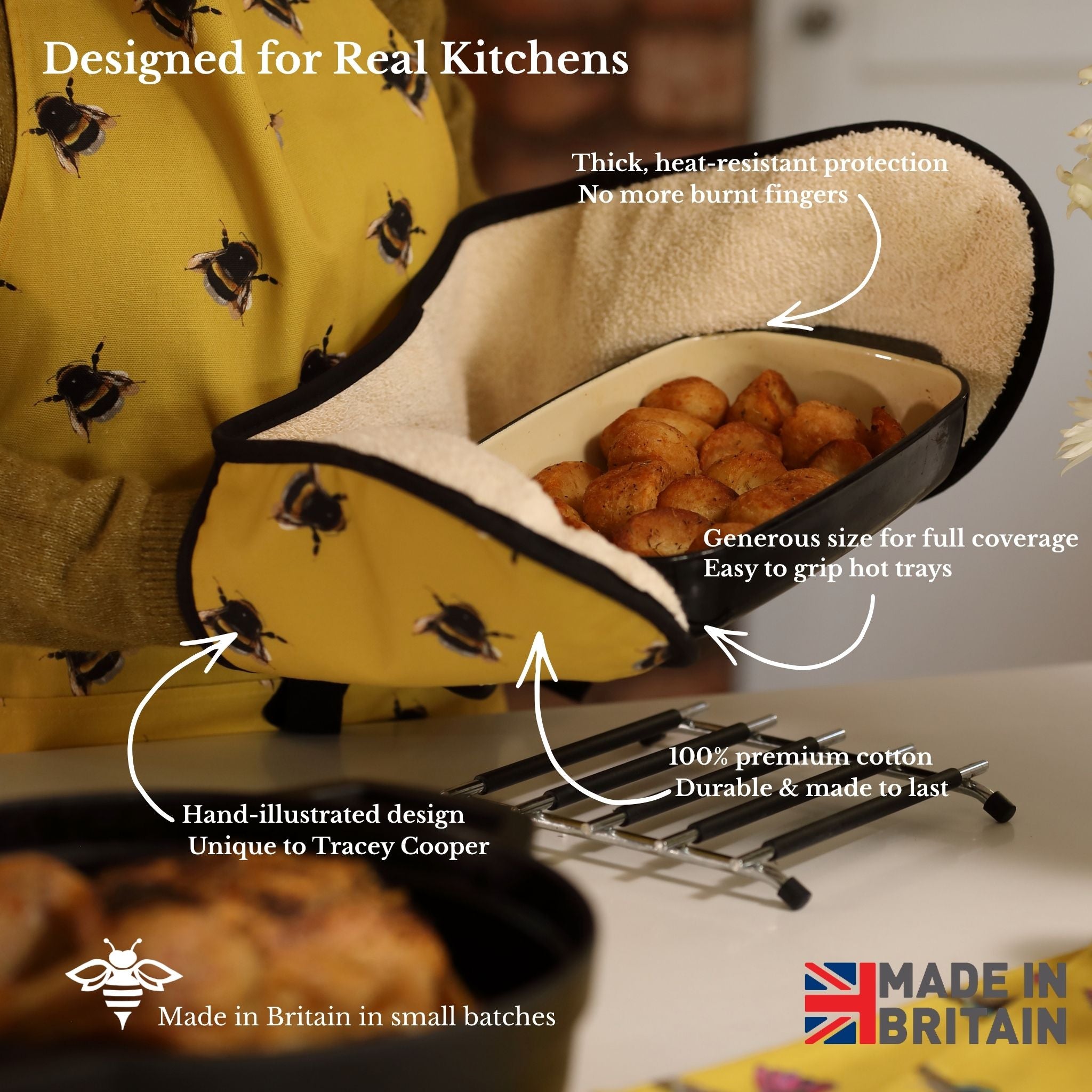 Bee oven gloves taking hot dish out of oven