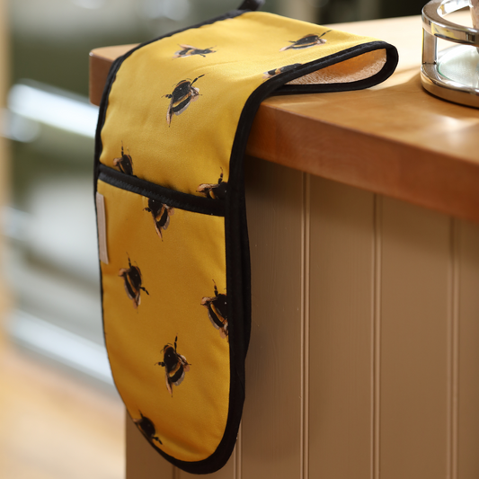 Hand-illustrated Bee Double Oven Glove by Tracey Cooper — crafted from 100% cotton in bright yellow, bringing cheerful British charm to your kitchen.