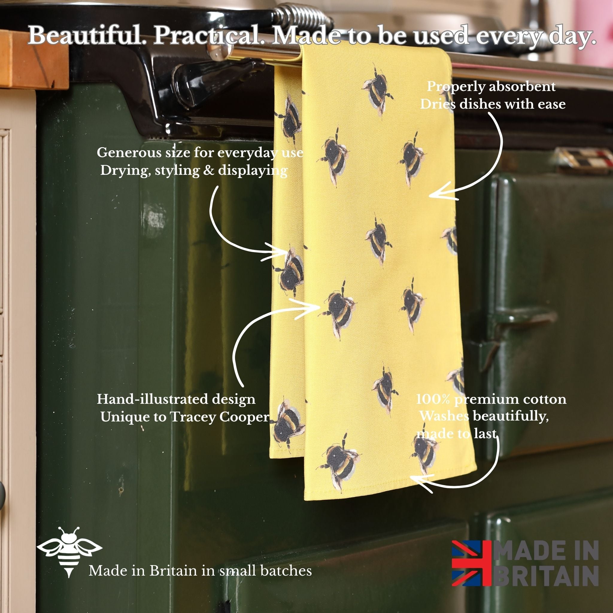 Yellow towel with bee pattern hanging on a green oven, with text describing its features.