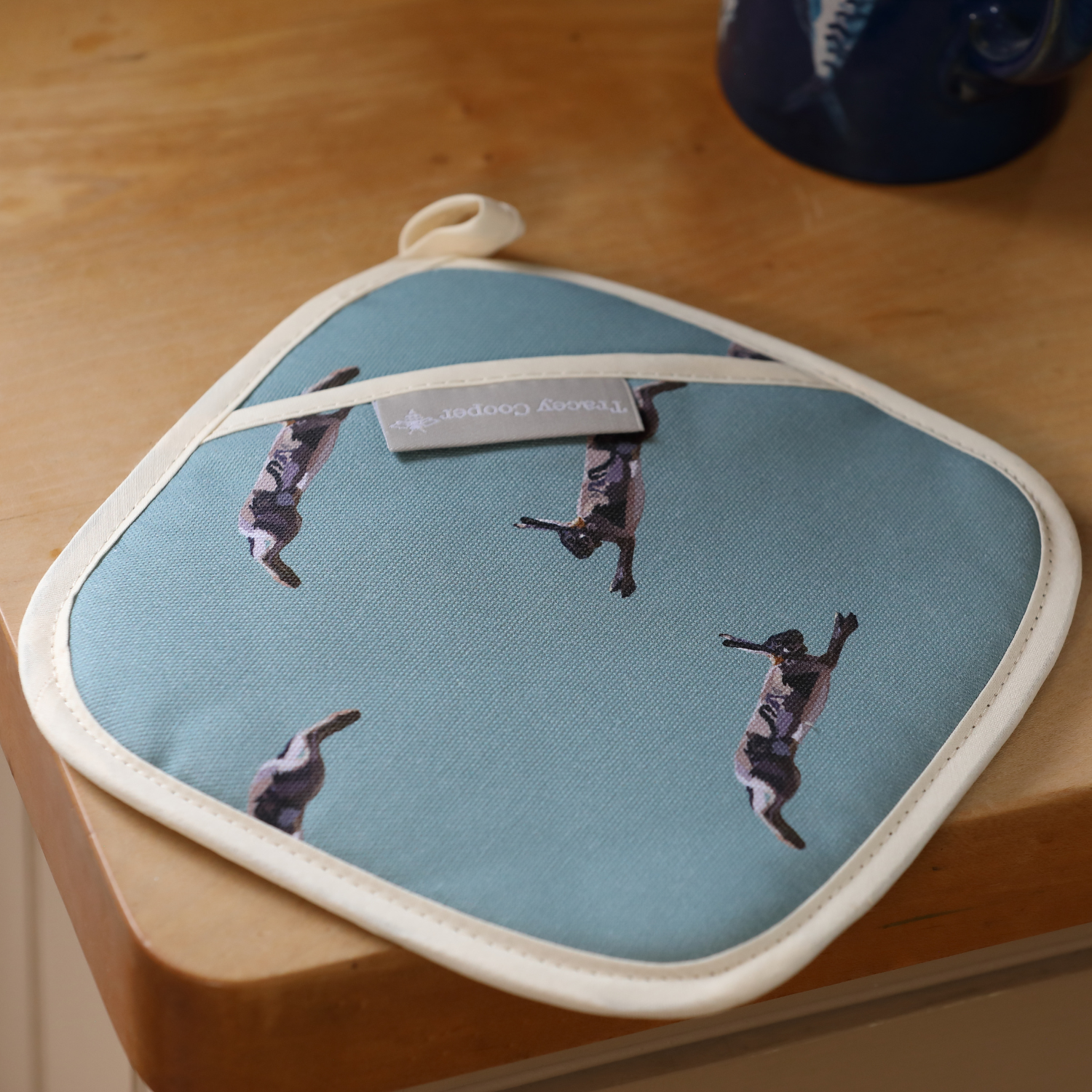 Hand illustrated brown hare oven glove made in England