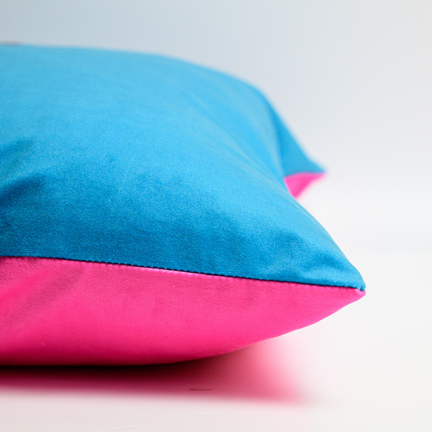 Cockatoo velvet cushion with hand-illustrated bird design by Tracey Cooper Homeware side view