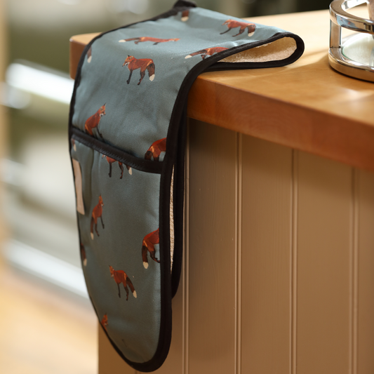 Hand-illustrated Fox Double Oven Glove by Tracey Cooper — crafted from 100% cotton in sage green to bring woodland artistry and warmth to your kitchen.