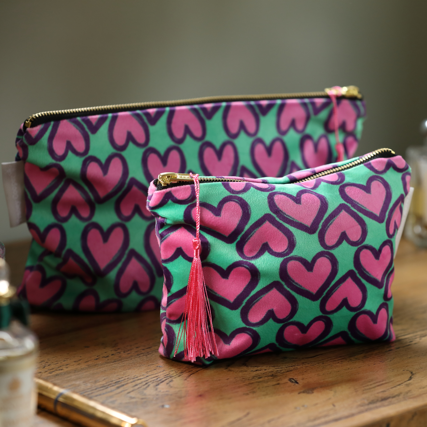 Green hearts velvet makeup bag with hand-illustrated design by Tracey Cooper Homeware