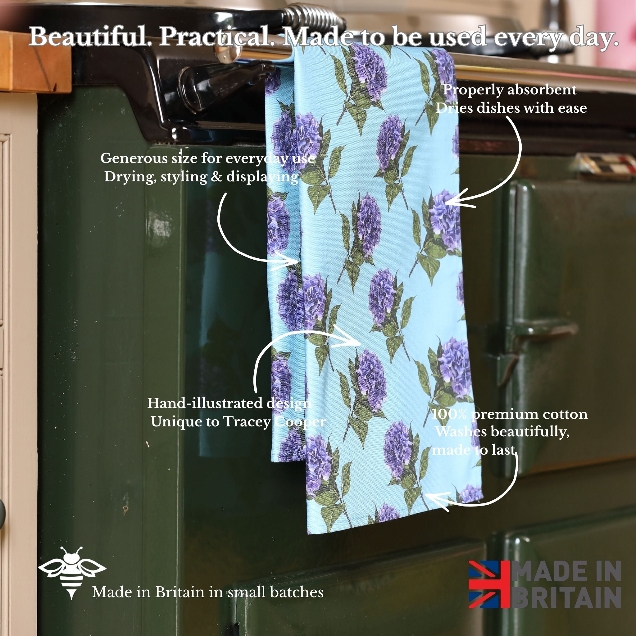 Floral towel hanging on a kitchen rack with product features highlighted.