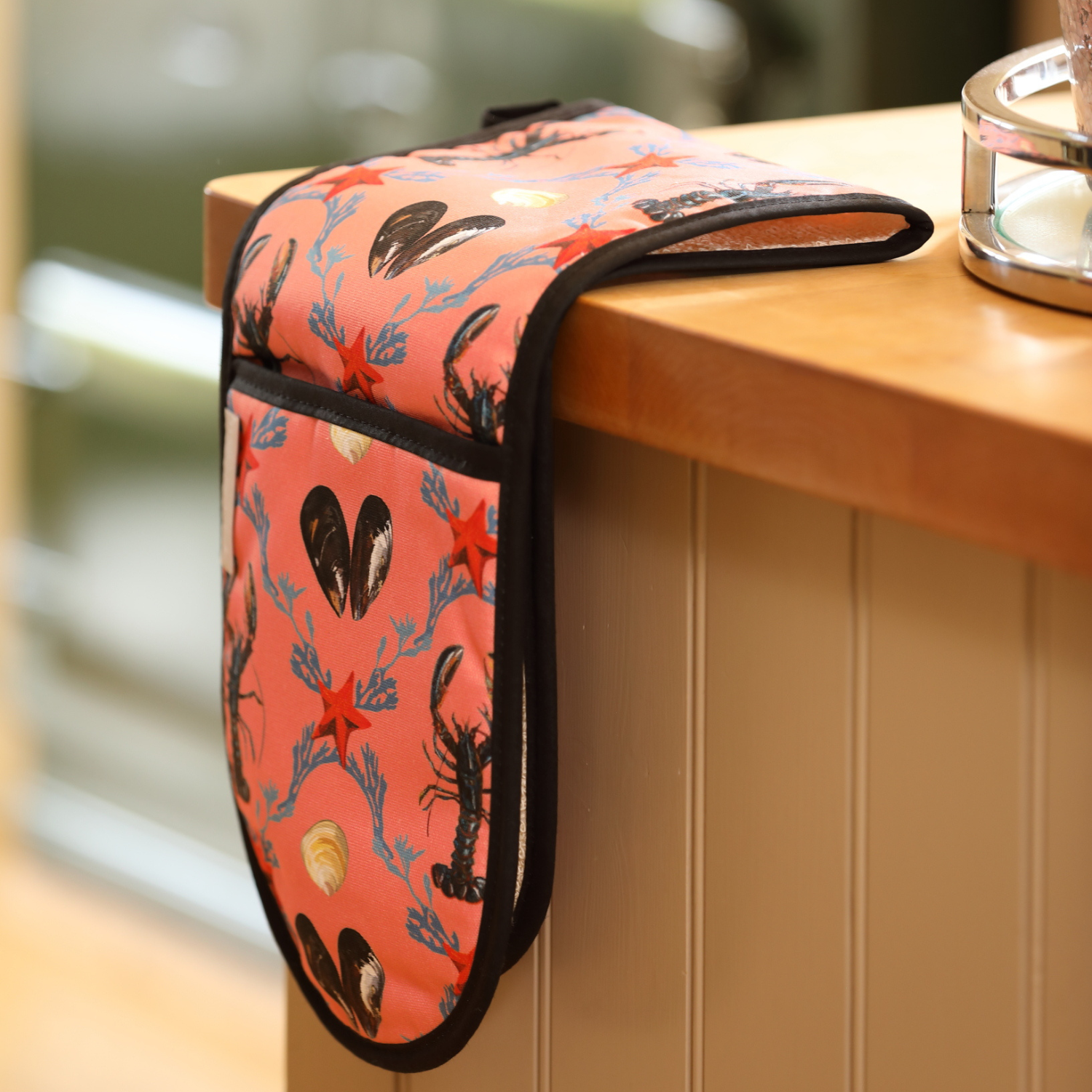 Hand-illustrated Lobster Double Oven Glove by Tracey Cooper — crafted from 100% cotton in salmon pink, bringing coastal artistry and warmth to your kitchen.