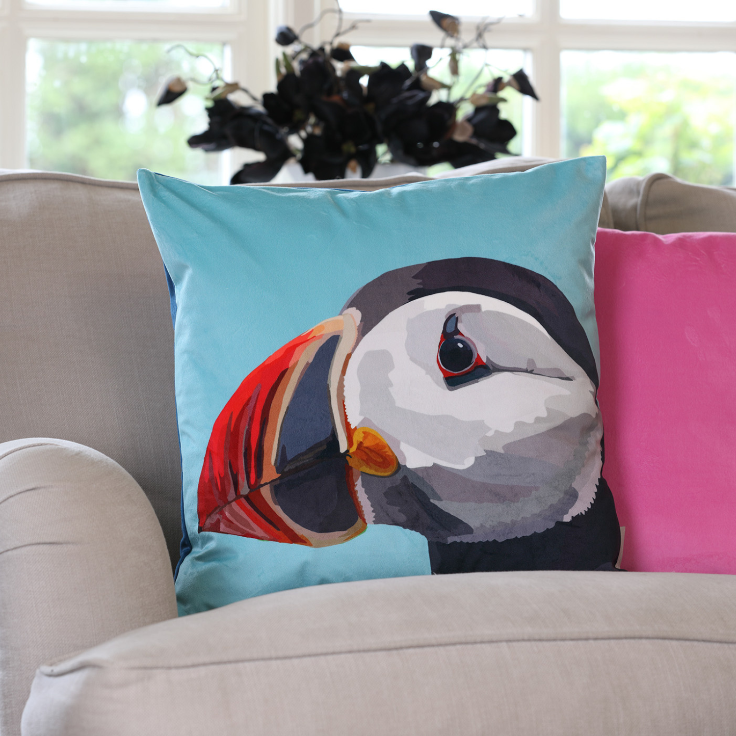Puffin velvet cushion with hand-illustrated puffin design by Tracey Cooper
