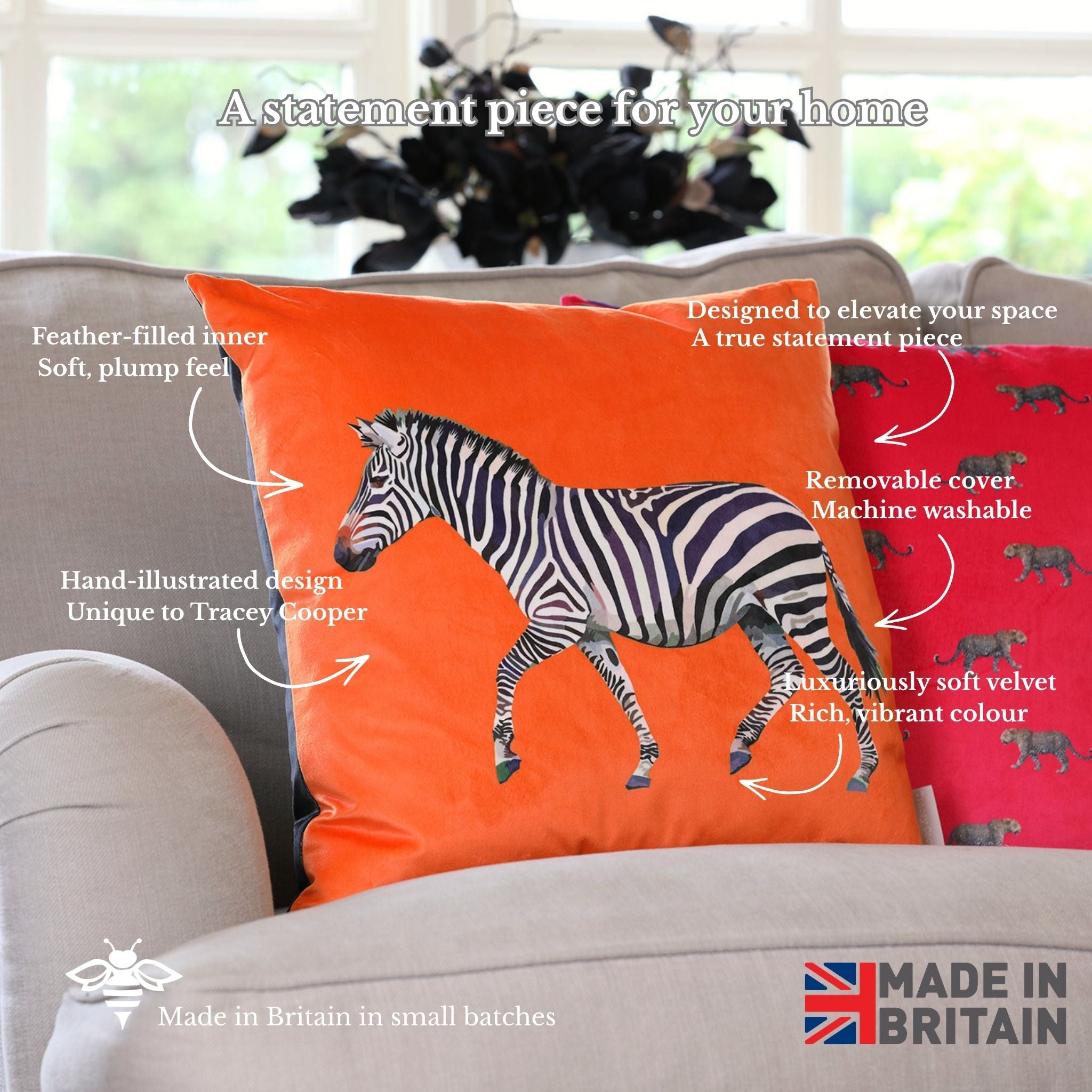 Orange pillow with zebra design on a sofa, featuring text about the product.