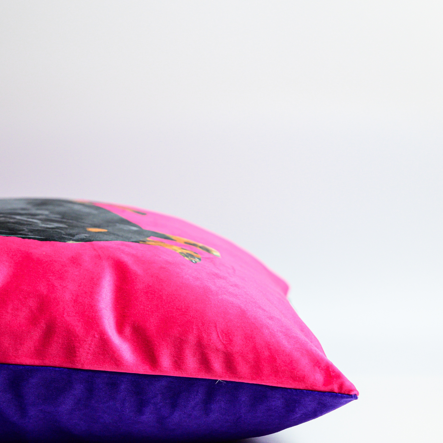 Sausage dog velvet cushion with hand-illustrated Dachshund design by Tracey Cooper Homeware side view