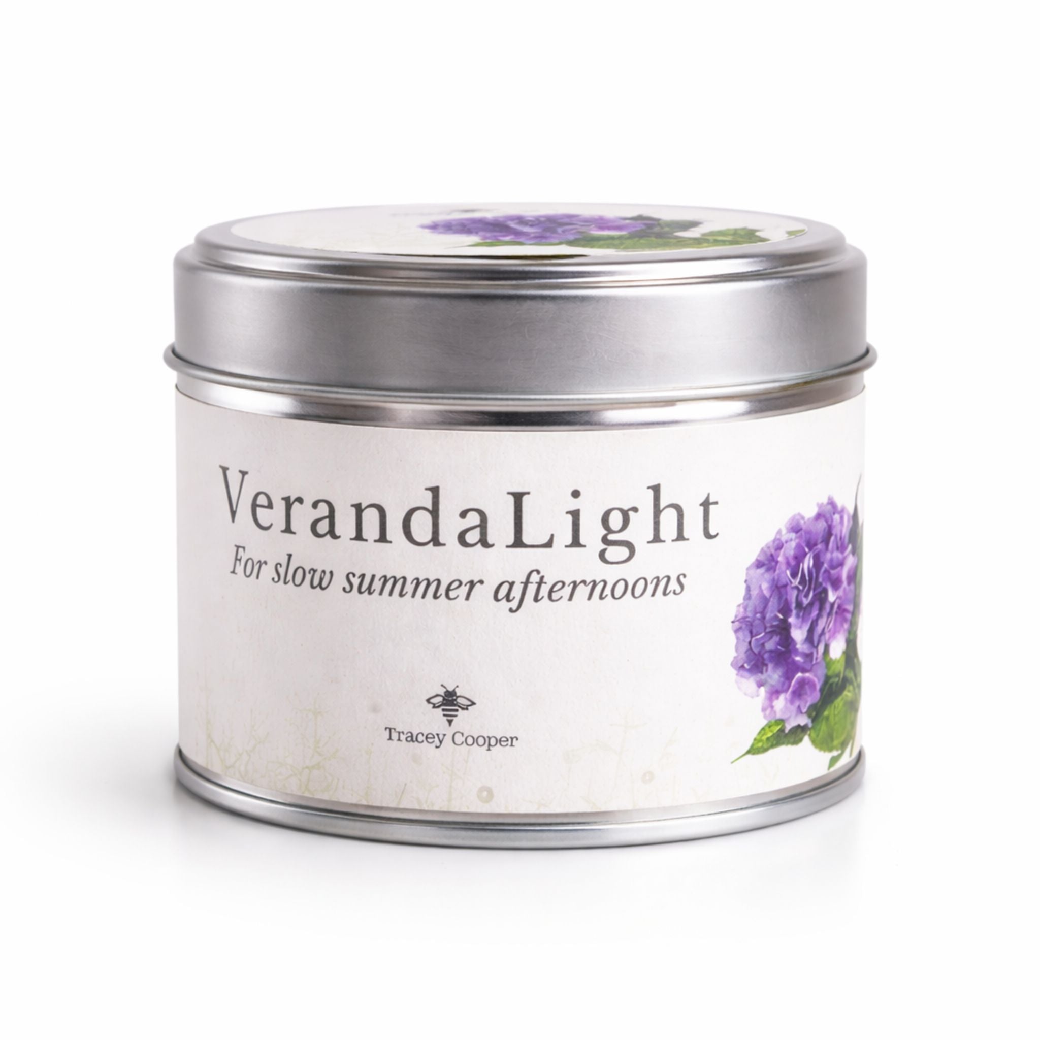 VerandaLight candle tin with a purple flower design on a white background